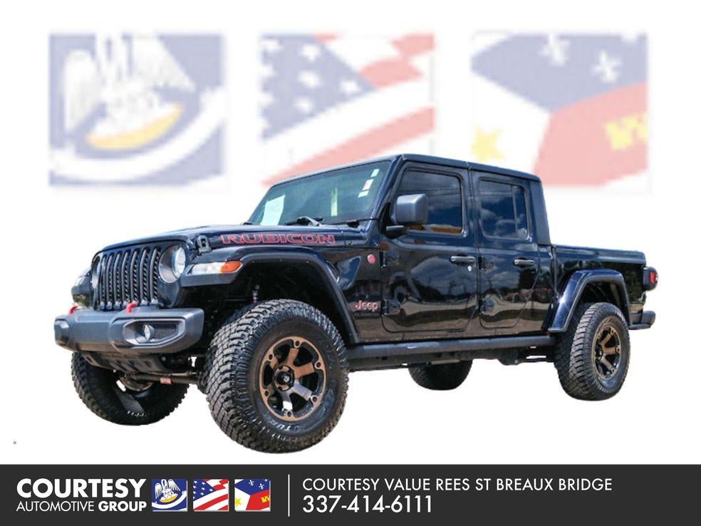 2021 Jeep Gladiator Rubicon in Black Clearcoat — front three-quarter view