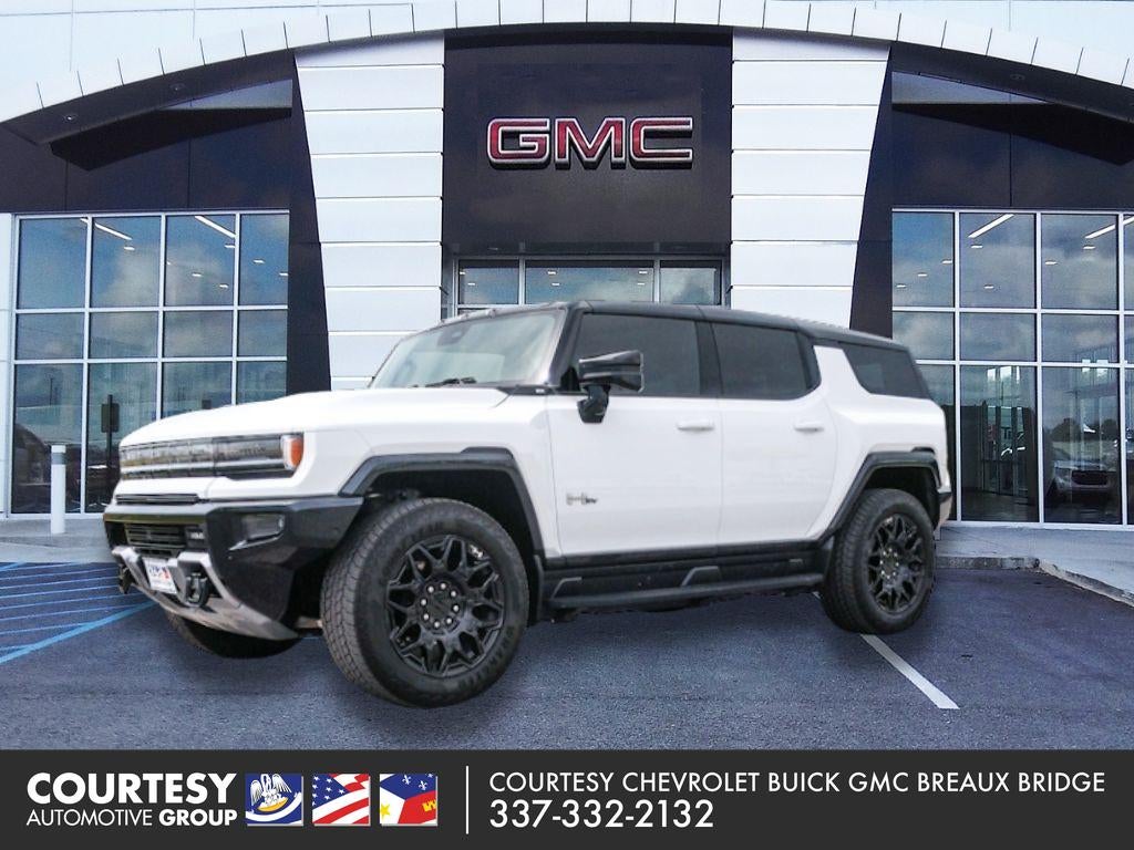 2026 GMC Hummer EV SUV 2X in Interstellar White — front three-quarter view