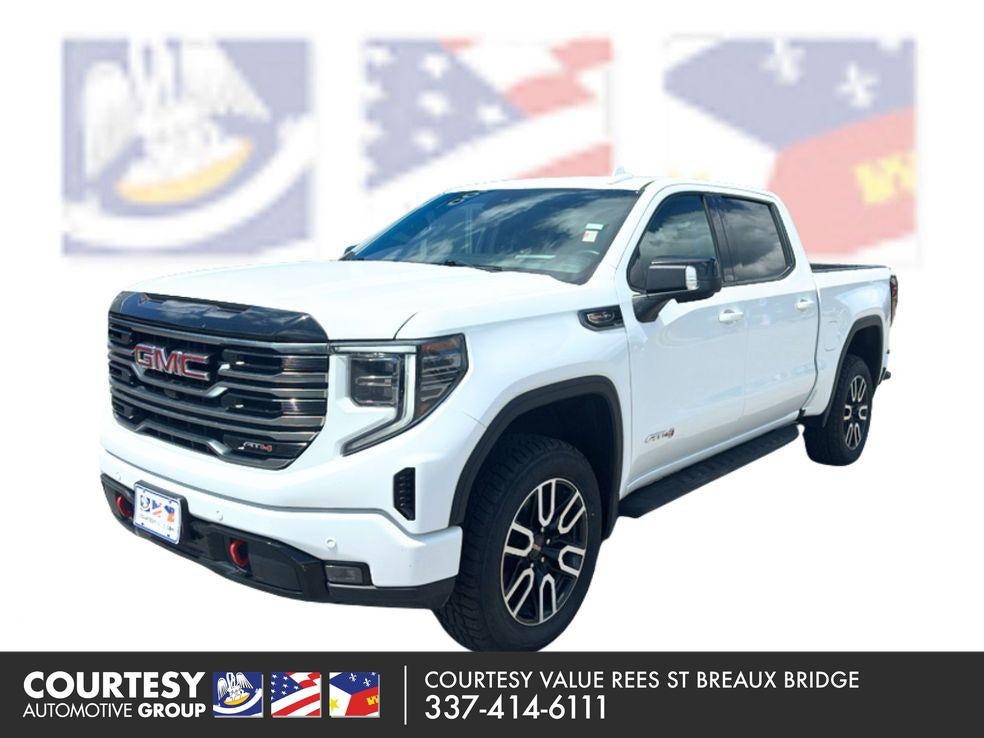 2025 GMC Sierra 1500 AT4 in Summit White — front three-quarter view