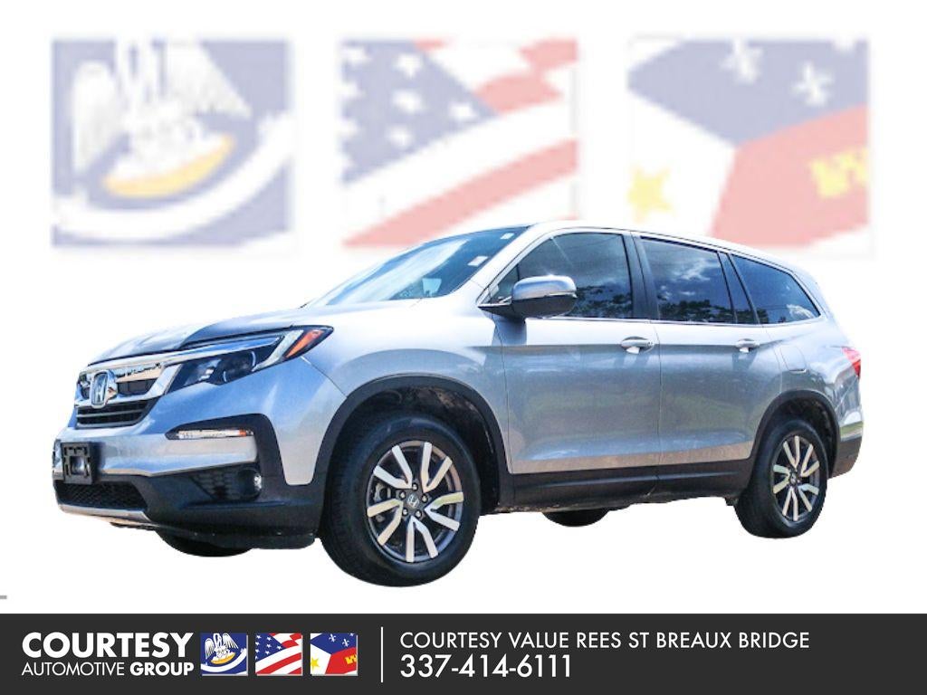 2022 Honda Pilot EX-L in Lunar Silver Metallic — front three-quarter view
